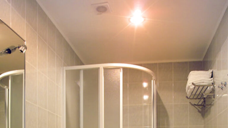 Can You Put A Regular Light Bulb In A Bathroom Heat Lamp? Is It Safe to Replace?
